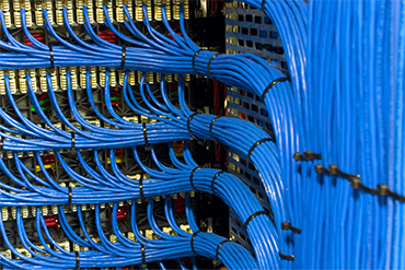 Organized cable management systems for network stability
